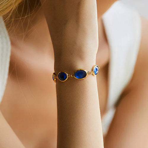 Charming Blue Stone Gold Bracelet