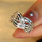 Elegant Wave Cross Zirconia Ring