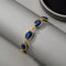 Charming Blue Stone Gold Bracelet